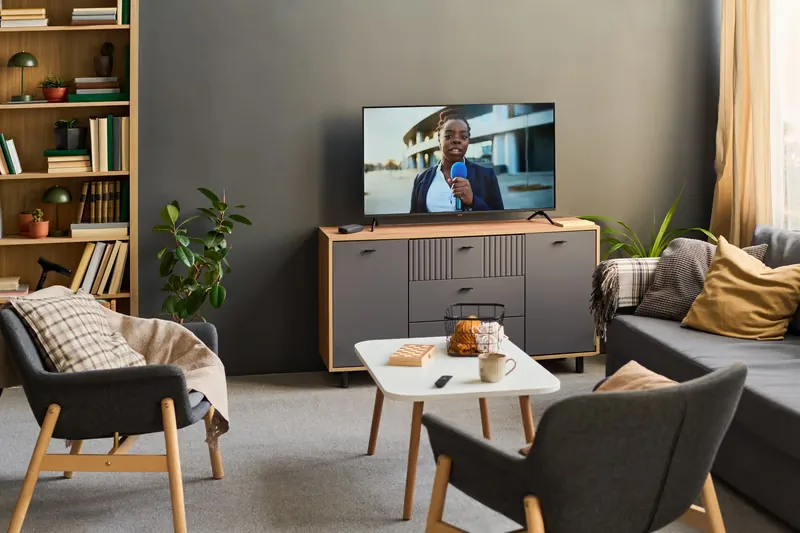Modern Smart TV in a living room, a top device for IPTV